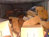 Uninsured cargo which the shipper, themselves, badly loaded with this result - what it doesn't show is the liquid contained in these boxes leaked into the container's floor causing the shipper loss on the value, the cost to clean the container out, and replace the floor!